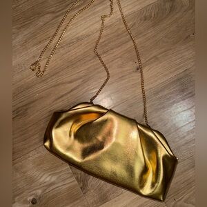 Brand new gold clutch